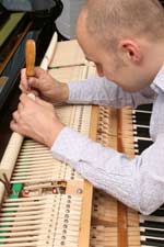 stuart tuning a piano